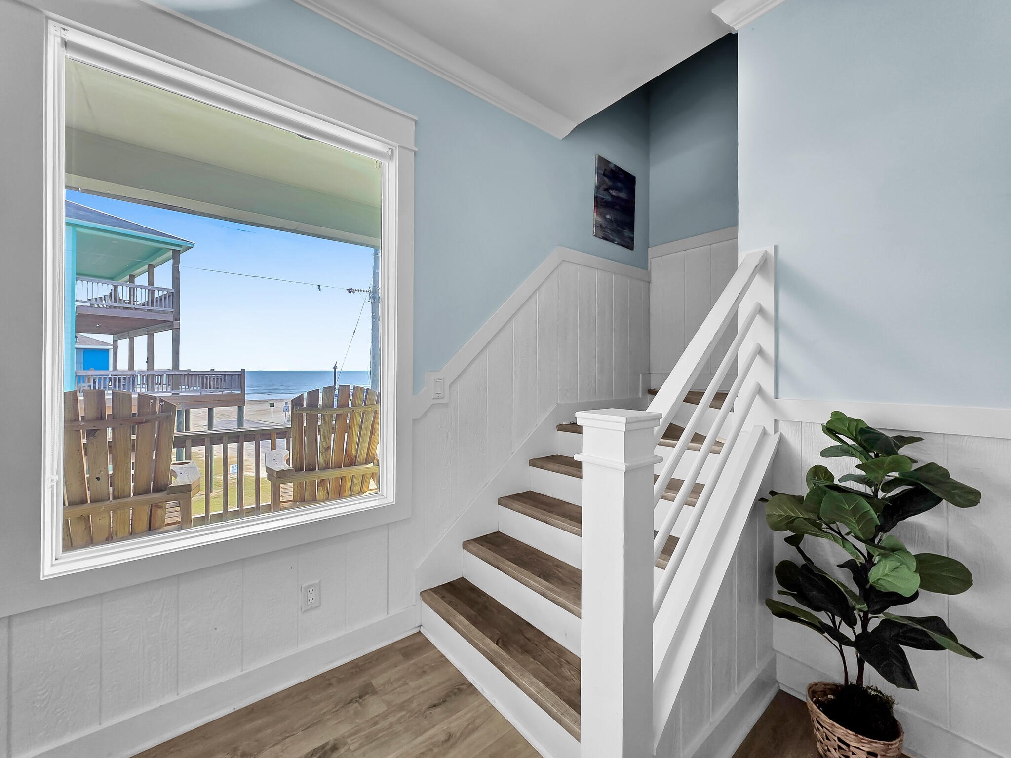 816 South Crystal Beach Road Crystal Beach, TX 77650 - Photo 35 of 48 a view of entryway and hall with wooden floor