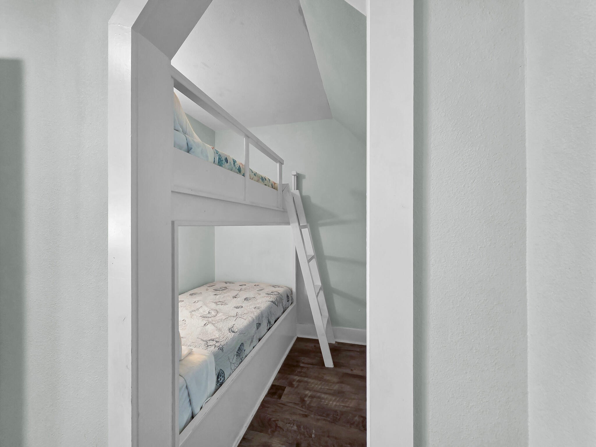 816 South Crystal Beach Road Crystal Beach, TX 77650 - Photo 36 of 48 a bedroom with a bed and a mirror