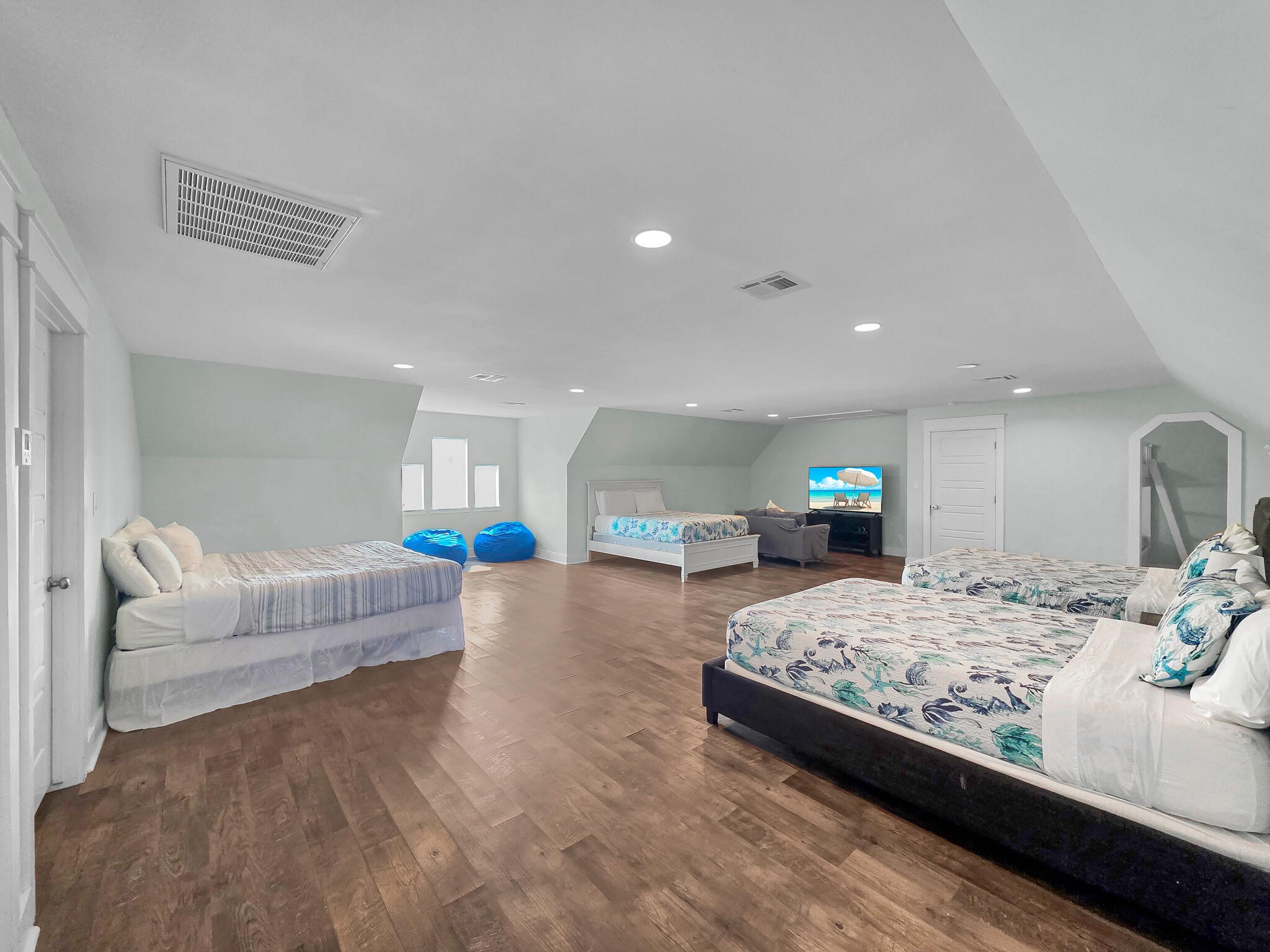 816 South Crystal Beach Road Crystal Beach, TX 77650 - Photo 38 of 48 a bedroom with a bed and a couch