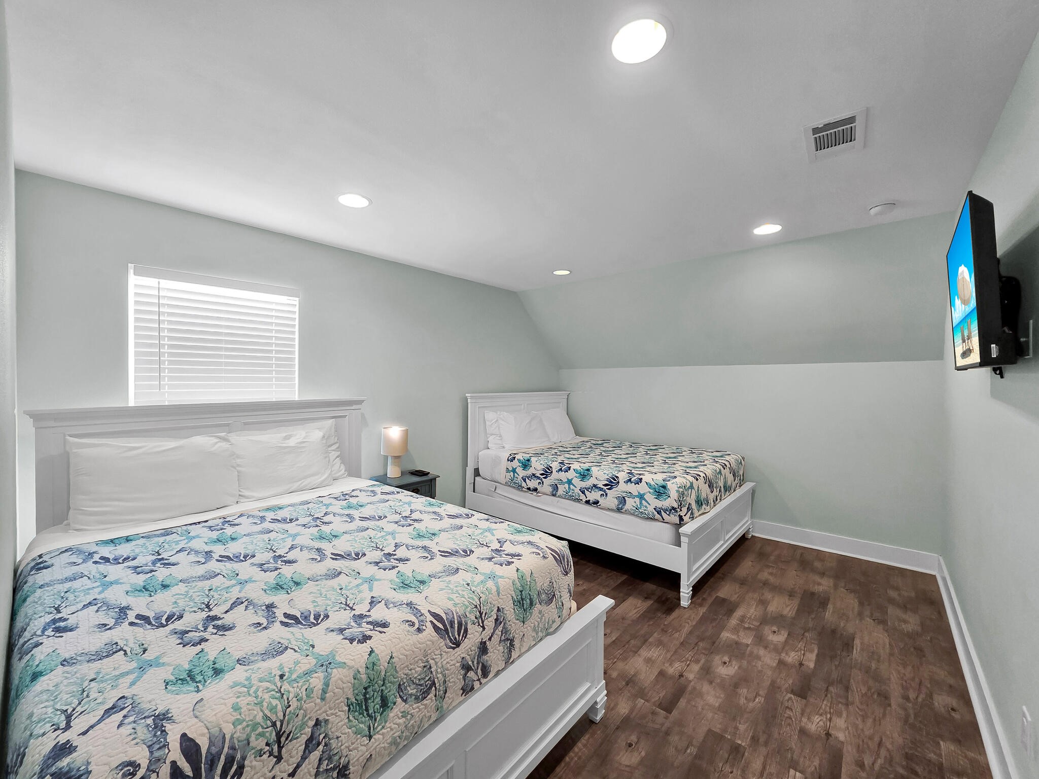 816 South Crystal Beach Road Crystal Beach, TX 77650 - Photo 43 of 48 a bedroom with a bed and a couch