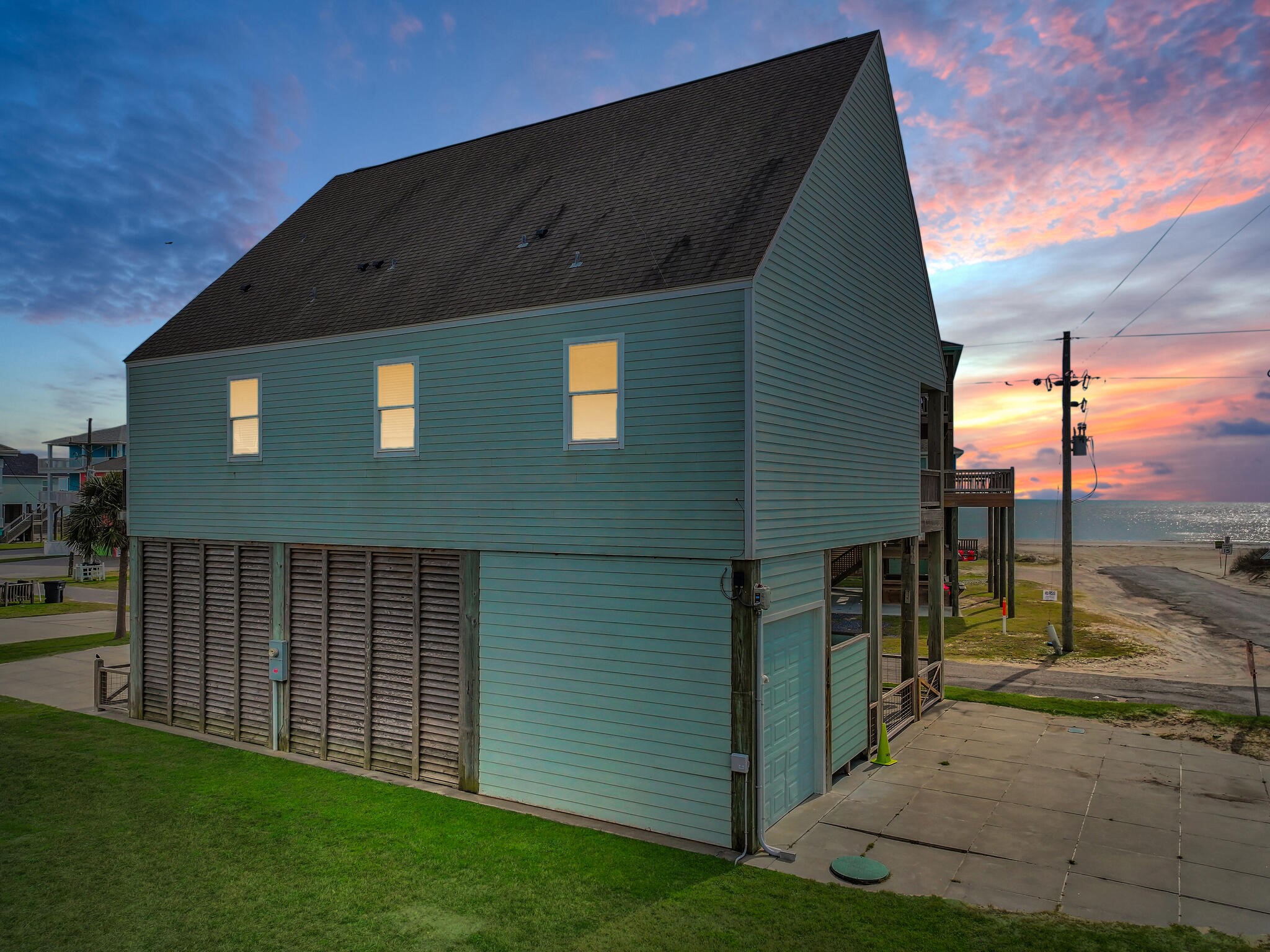 816 South Crystal Beach Road Crystal Beach, TX 77650 - Photo 48 of 48 a front view of a house with a yard