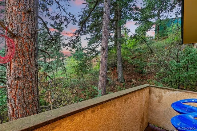 a view of a swimming pool from a balcony