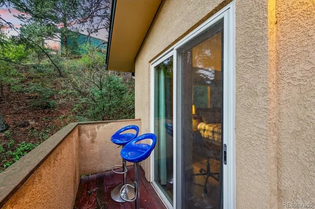 a view of a door and chair