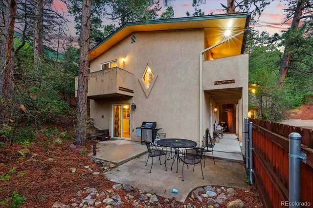 a bedroom with furniture and wooden floor
