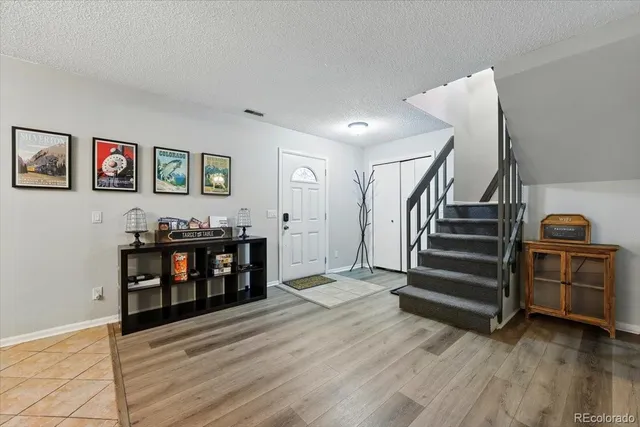 a kitchen with stainless steel appliances a stove sink and cabinets