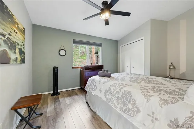 a bedroom with a bed and a table