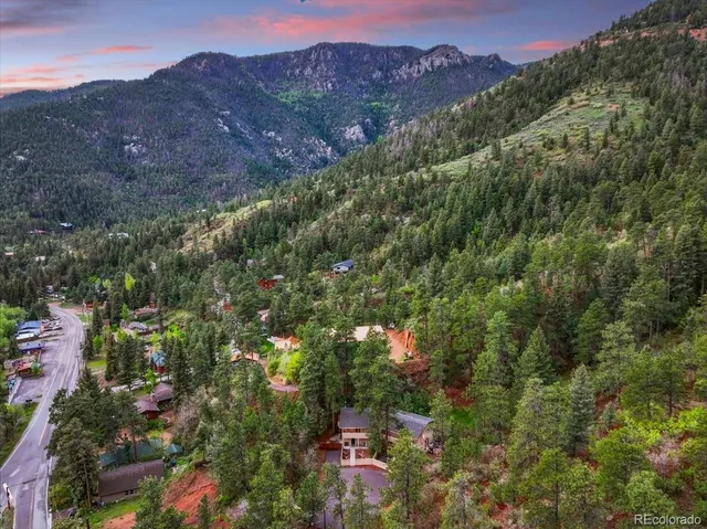 an aerial view of residential house and outdoor space