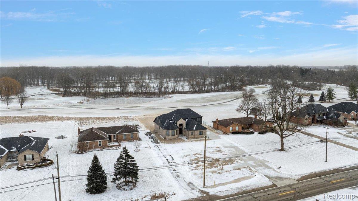 53650 Romeo Plank Road Macomb, MI 48042 - Photo 50 of 64 Snowy aerial view featuring a residential view