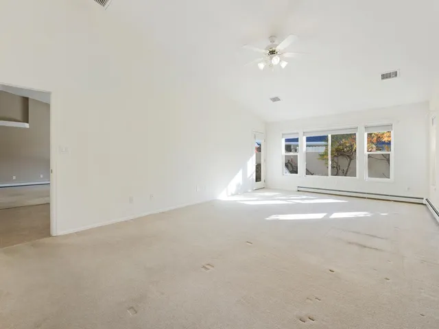 a view of empty room with a window