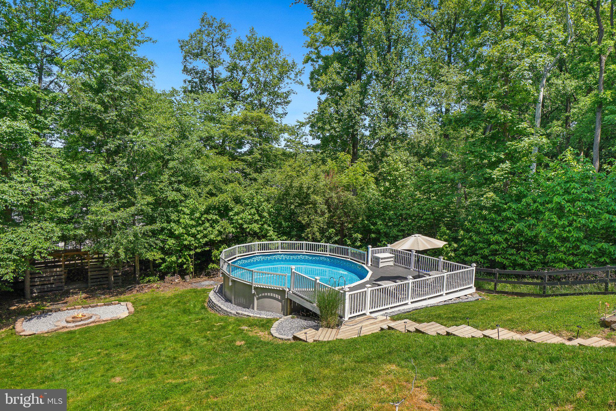 6348 Quinn Road Frederick, MD 21701 - Photo 28 of 28 Serene backyard oasis with pool.