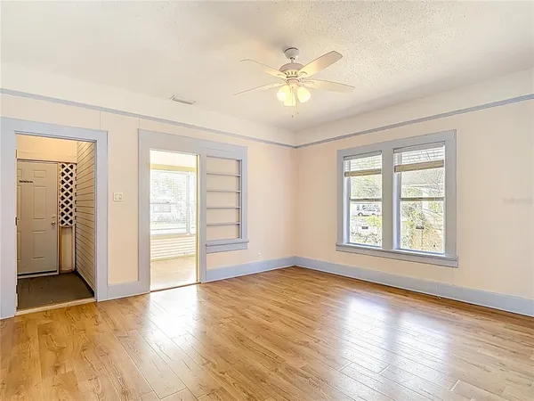 a view of a kitchen with a sink and cabinet