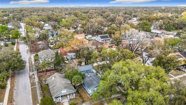a house with trees in front of it