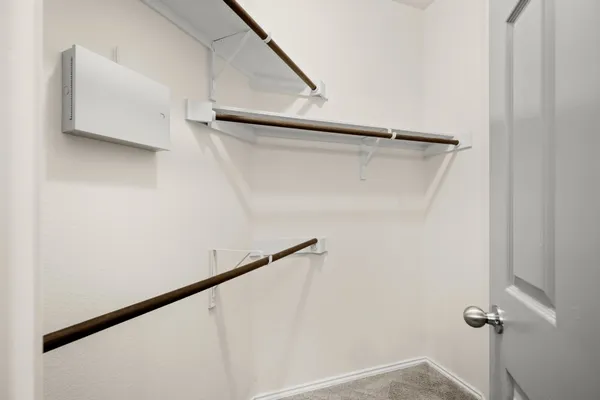 a view of small space with racks on the wall