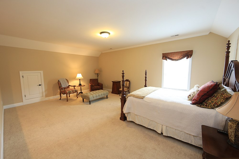 8448 Lentic Court Raleigh, NC 27615 - Photo 21 of 25 Plenty of space for whatever you need...rec room, craft space, extra TV room or bedroom. Bonus Room