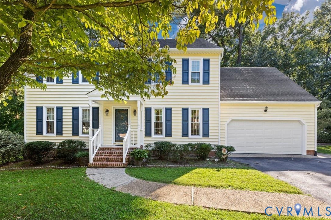 13905 Shadow Ridge Lane Midlothian, VA 23112 - Photo 3 of 55 Two-story residence featuring light yellow siding