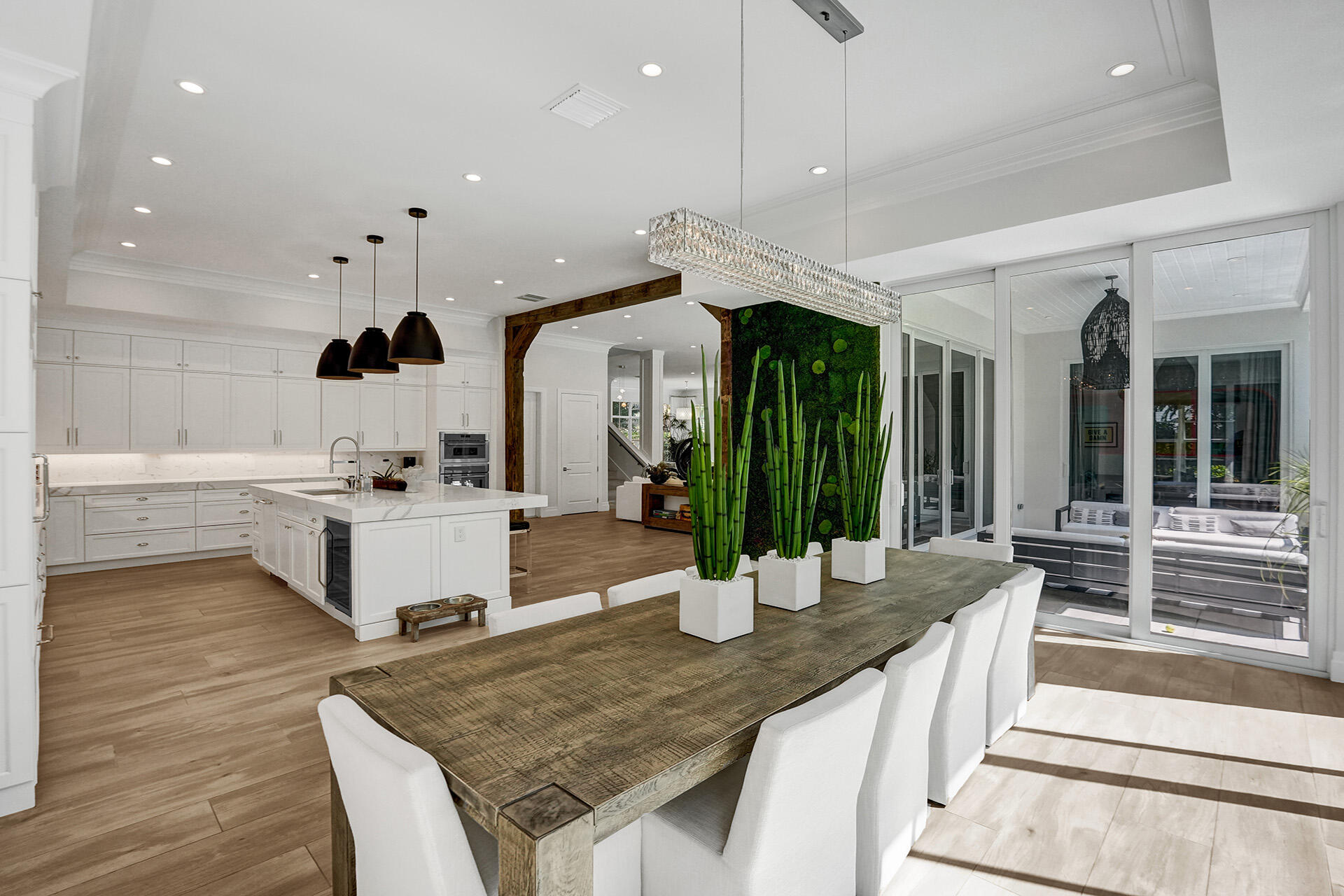 700 Northwest 6th Street Boca Raton, FL 33486 - Photo 16 of 40 a kitchen with stainless steel appliances granite countertop a kitchen island a stove and a sink