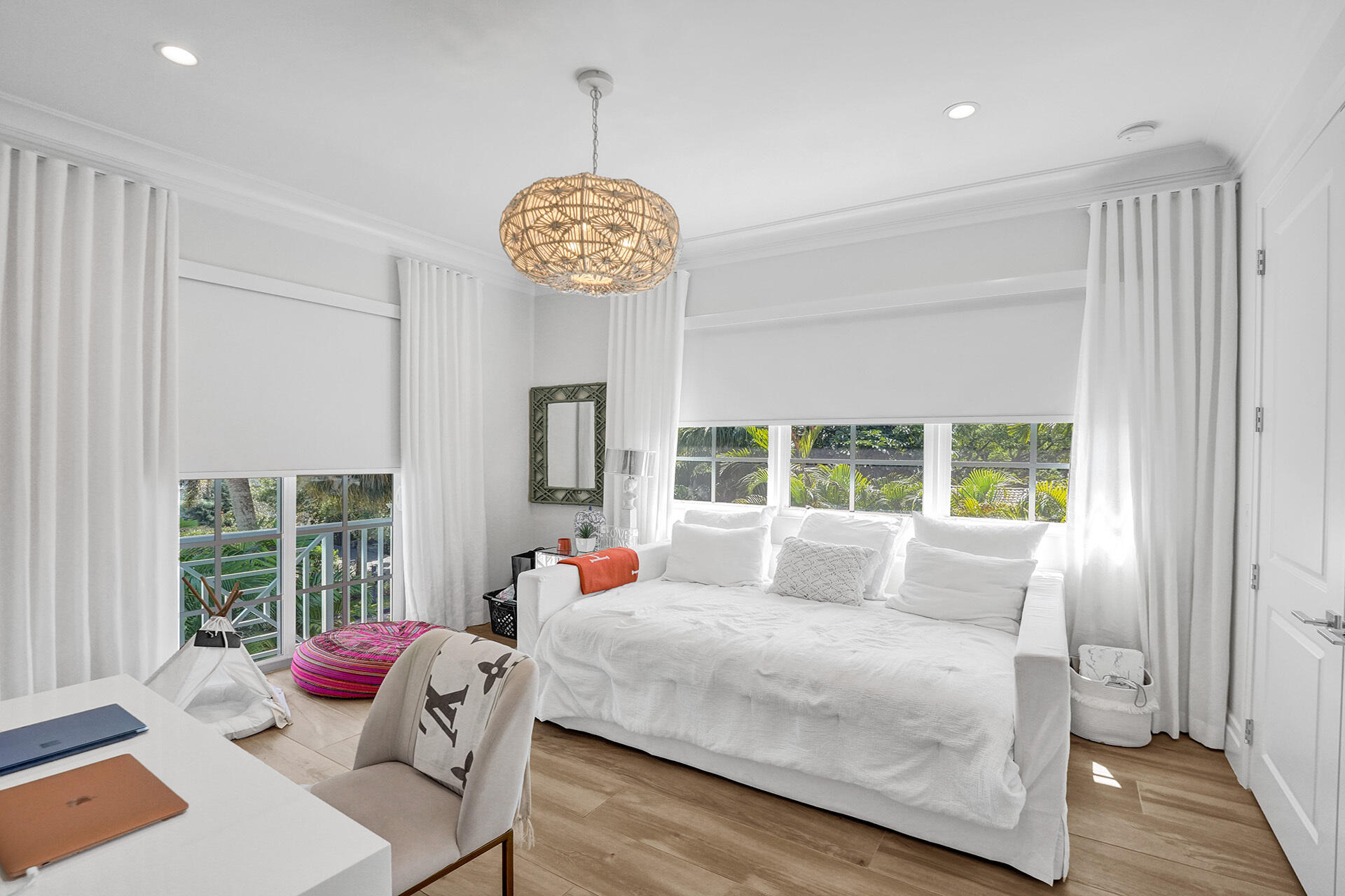 700 Northwest 6th Street Boca Raton, FL 33486 - Photo 28 of 40 a bedroom with furniture and a large window