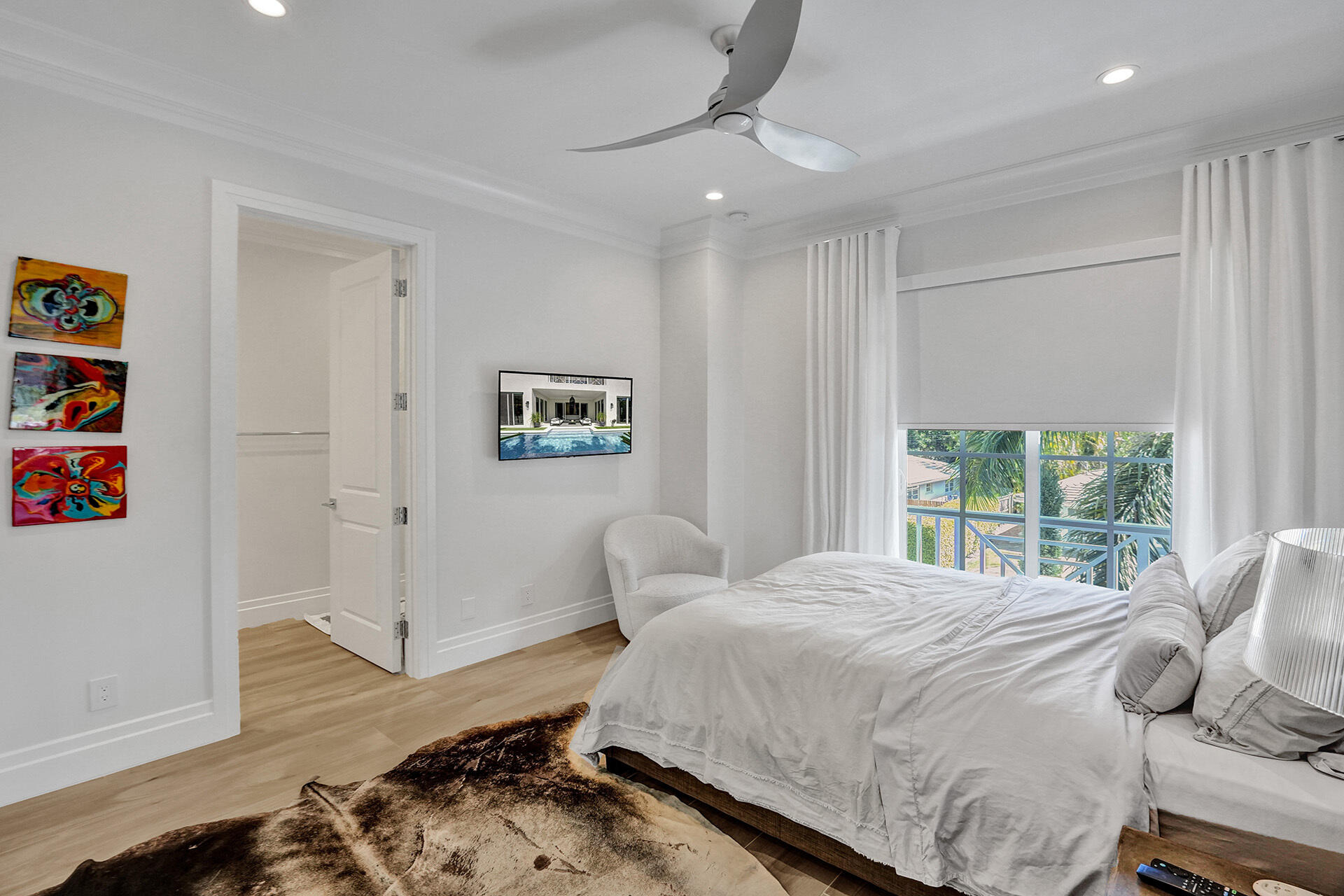 700 Northwest 6th Street Boca Raton, FL 33486 - Photo 30 of 40 a bedroom with a bed and a window