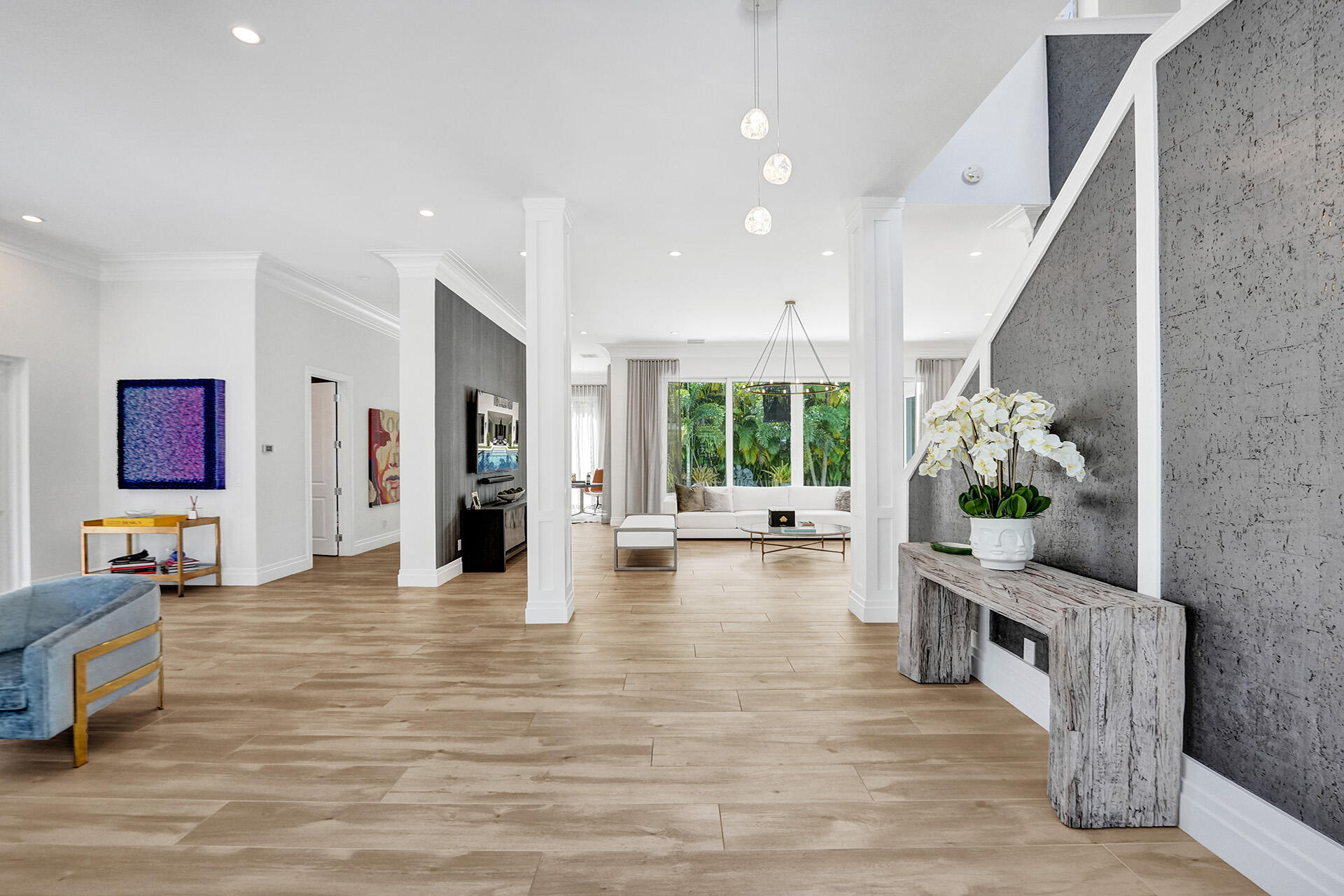 700 Northwest 6th Street Boca Raton, FL 33486 - Photo 3 of 40 a living room with furniture and a table