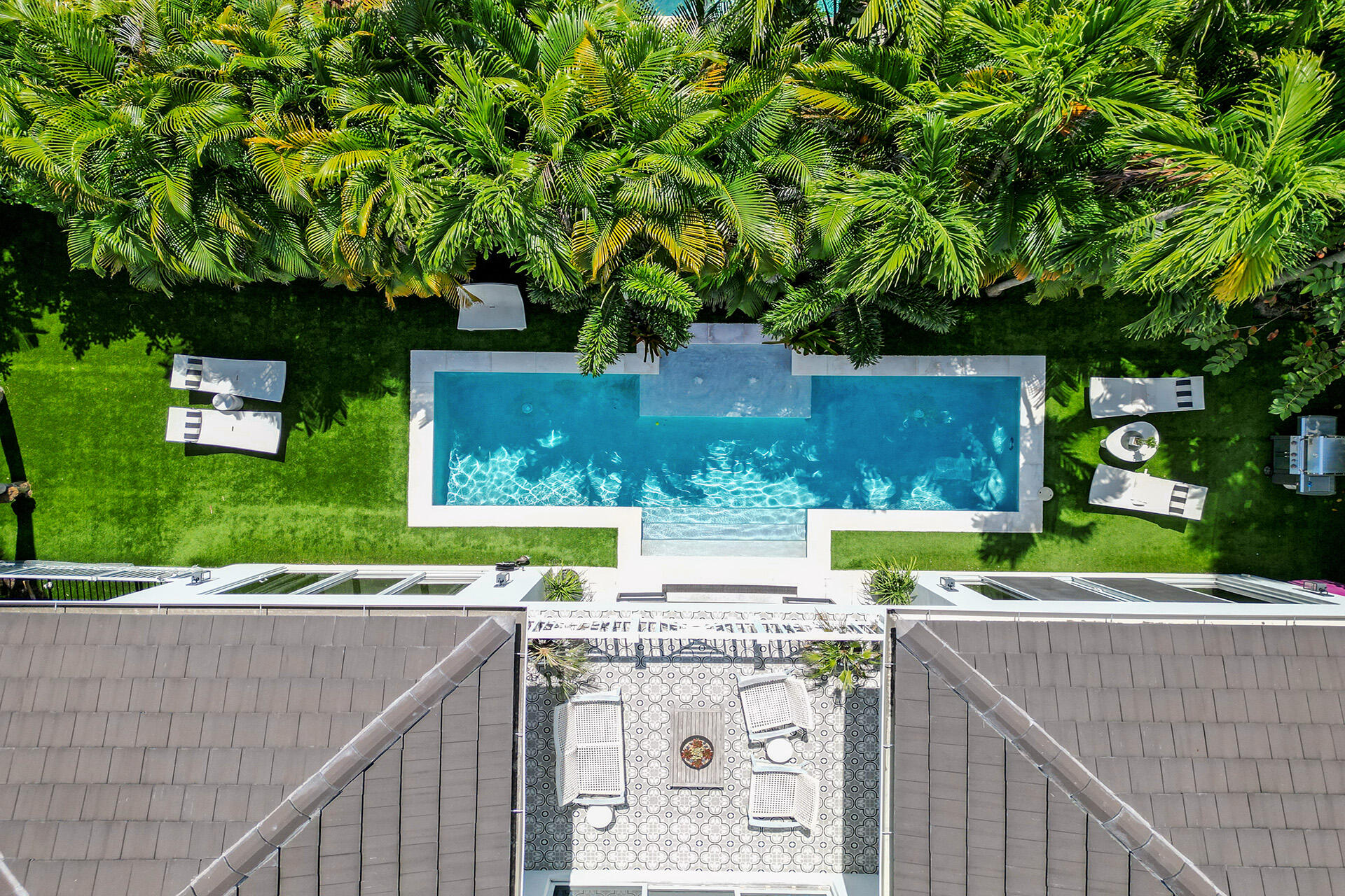 700 Northwest 6th Street Boca Raton, FL 33486 - Photo 36 of 40 a view of a terrace with a bench