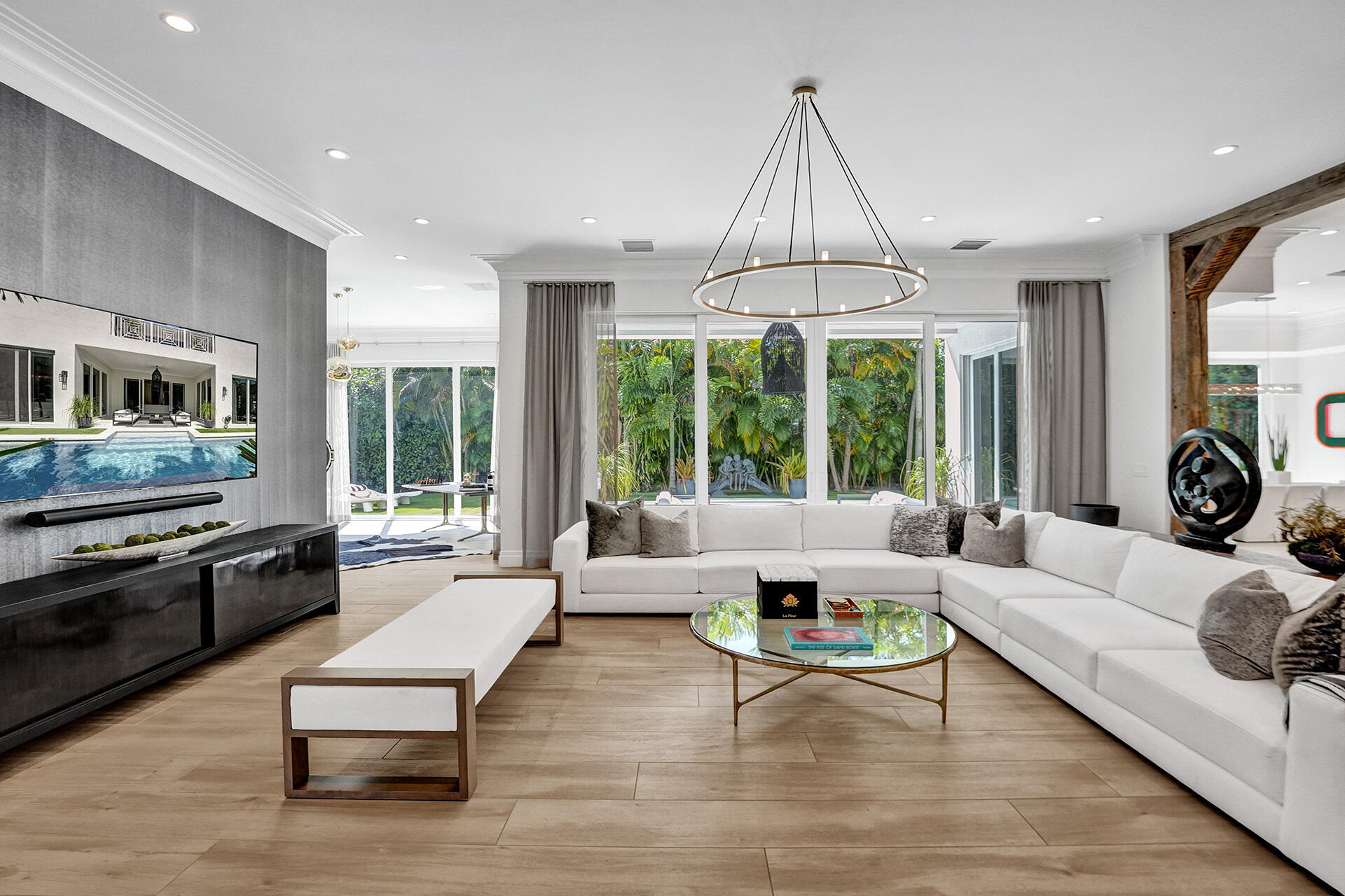 700 Northwest 6th Street Boca Raton, FL 33486 - Photo 10 of 40 a living room with furniture and a flat screen tv