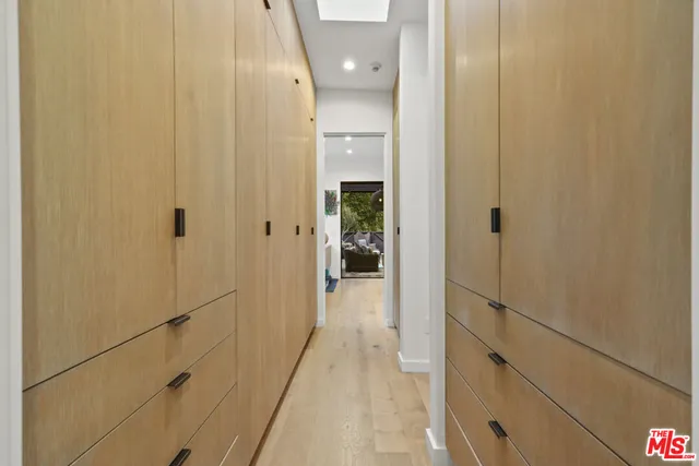 a view of a bathroom from a hallway