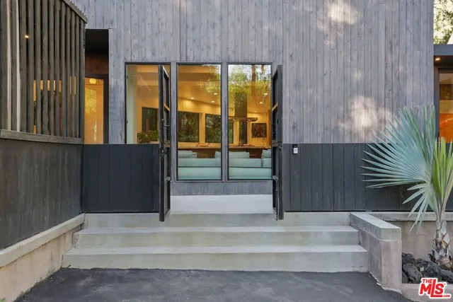 a bathroom with a tub and shower