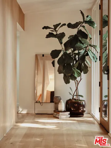 a vase of flowers sitting on a table