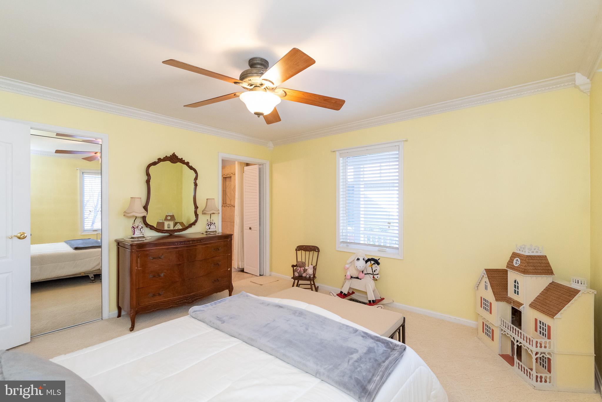 16550 Yeoho Road Sparks, MD 21152 - Photo 22 of 67 a bedroom with a bed and wooden floor