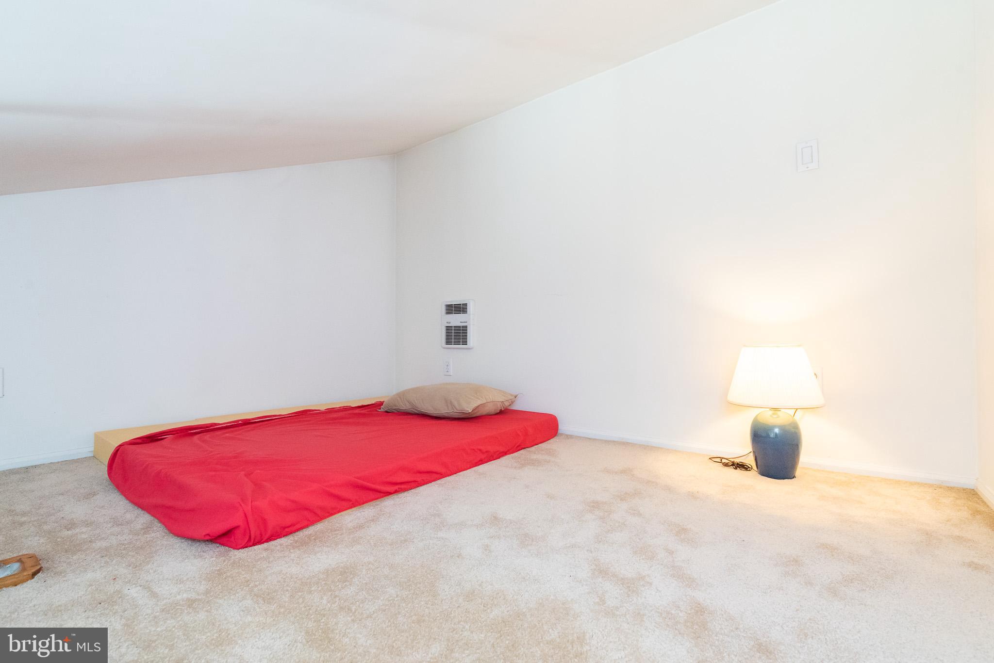 16550 Yeoho Road Sparks, MD 21152 - Photo 30 of 67 a bedroom with a bed and a night stand