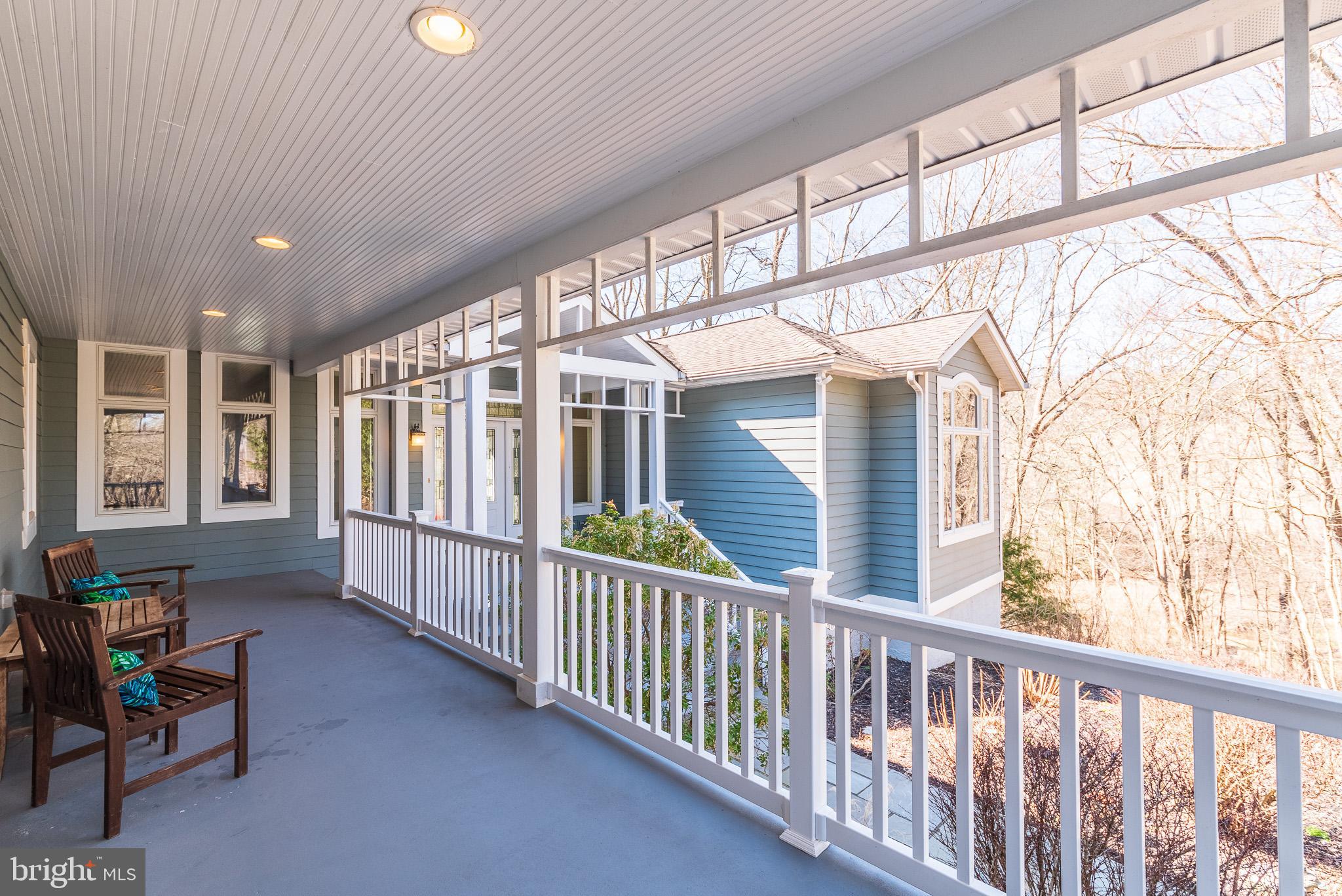 16550 Yeoho Road Sparks, MD 21152 - Photo 4 of 67 a view of a porch with furniture and roof