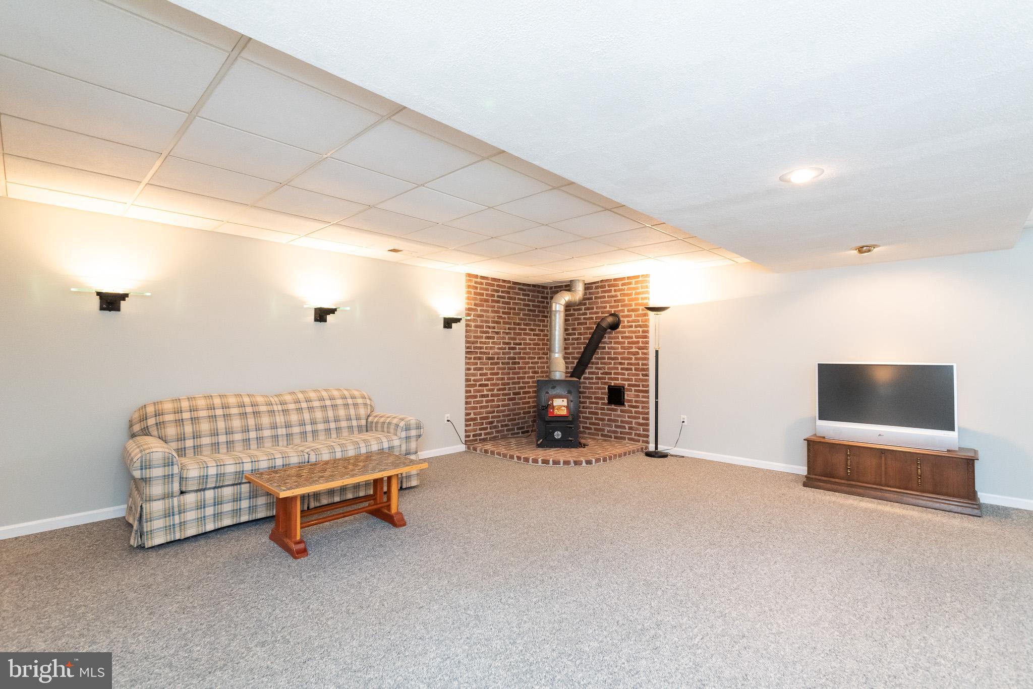 16550 Yeoho Road Sparks, MD 21152 - Photo 45 of 67 a view of livingroom with furniture and air hockey table