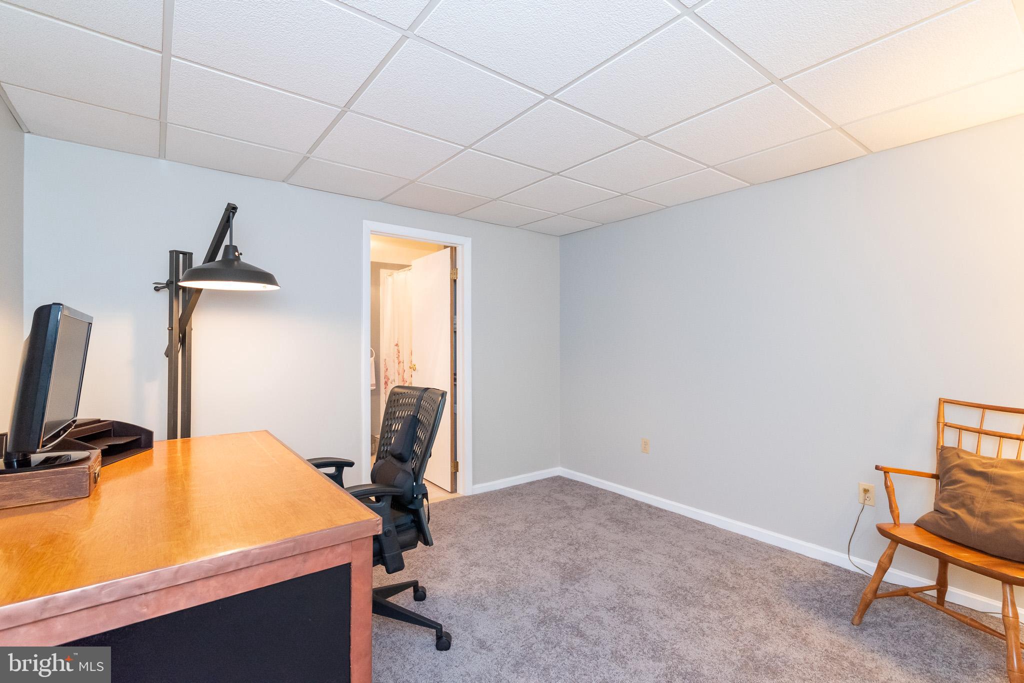 16550 Yeoho Road Sparks, MD 21152 - Photo 47 of 67 a room with gym equipment and a window