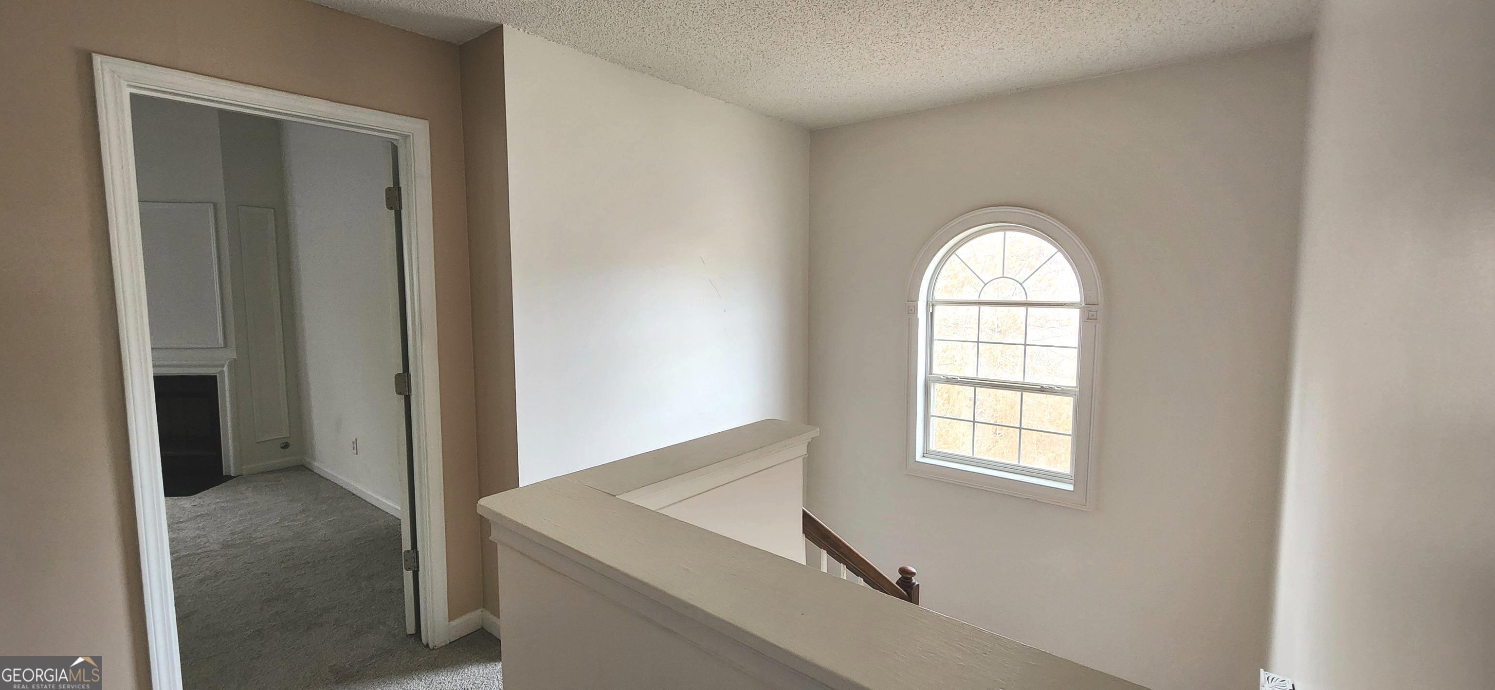 201 Reeves Creek Way Jonesboro, GA 30236 - Photo 17 of 30 Hallway to Master Bedroom