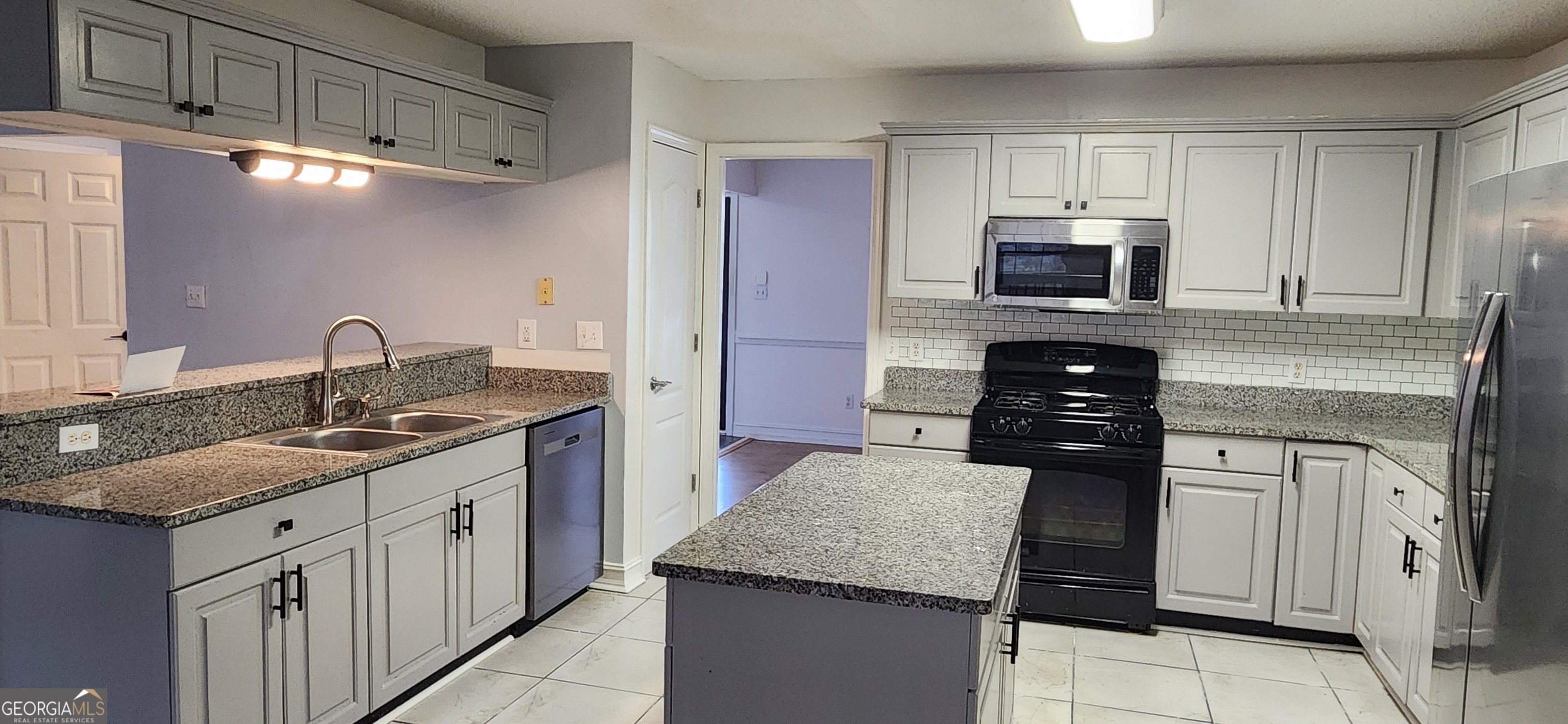 201 Reeves Creek Way Jonesboro, GA 30236 - Photo 7 of 30 A Cook's Kitchen with Island and Plenty of Storage