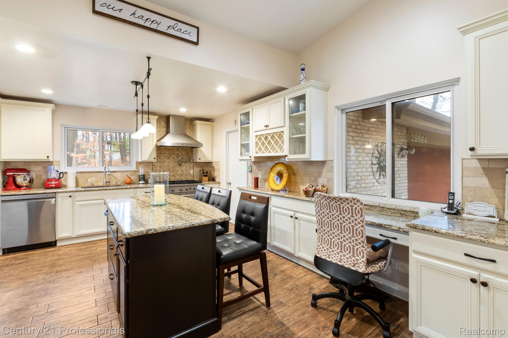 28664 West 12 Mile Road Farmington, MI 48334 - Photo 10 of 49 Island and built in desk in this Chef's Kitchen