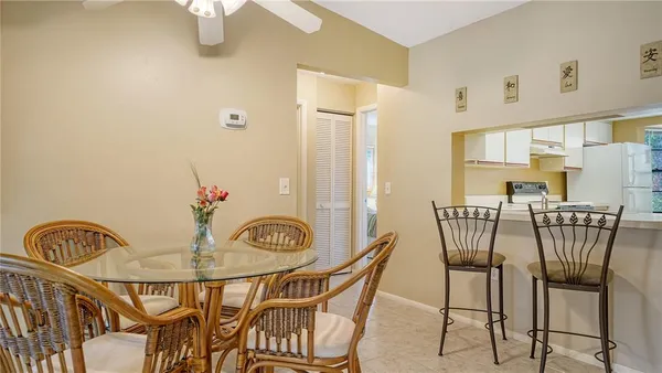 a view of a dining room with furniture