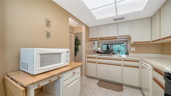 a kitchen with a stove and a microwave