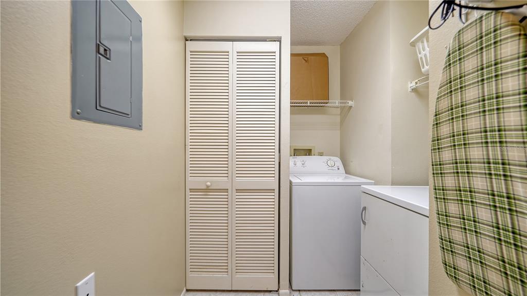 5649 Summerside Lane, Unit 41B Sarasota, FL 34231 - Photo 30 of 41 a utility room with dryer and washer