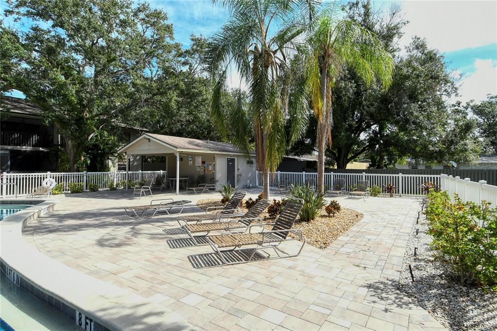 5649 Summerside Lane, Unit 41B Sarasota, FL 34231 - Photo 35 of 41 a view of a house with backyard