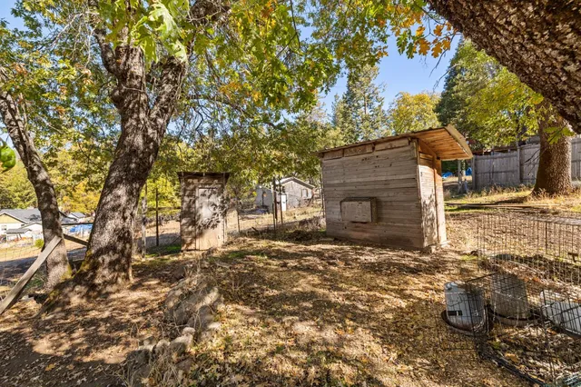 a backyard of a house with lots of green space