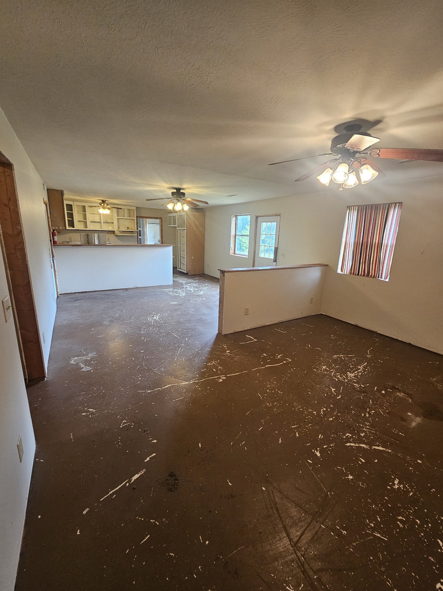 631 Union Ridge Road Wartrace, TN 37183 - Photo 9 of 26 an empty room with stairs and wooden floor