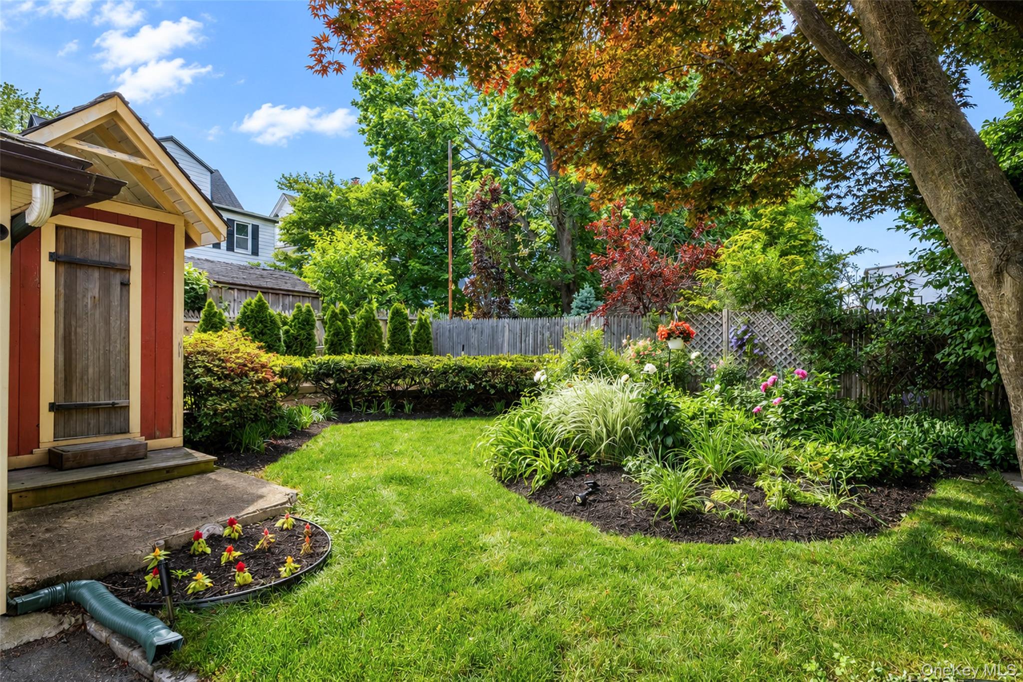 82 Clove Road New Rochelle, NY 10801 - Photo 36 of 39 a view of backyard with a garden and entertaining space