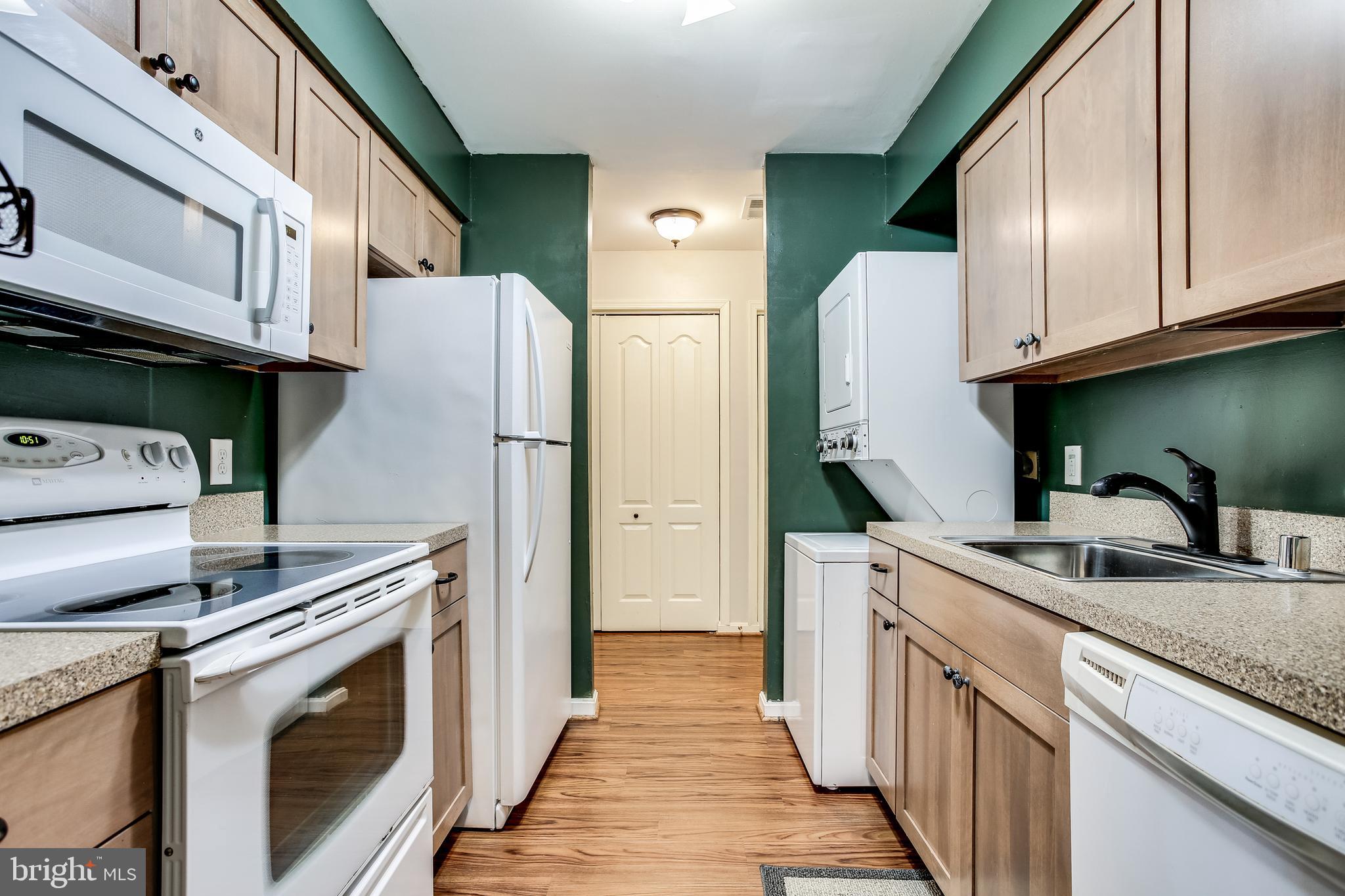 8381 Montgomery Run Road, Unit A Ellicott City, MD 21043 - Photo 9 of 26 Kitchen w/ New Flooring