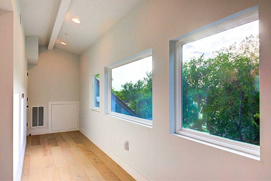 916 East 50th Street, Unit 1 Austin, TX 78751 - Photo 22 of 36 On the 3rd floor, you are greeted with more oversized picture windows with treetop views.