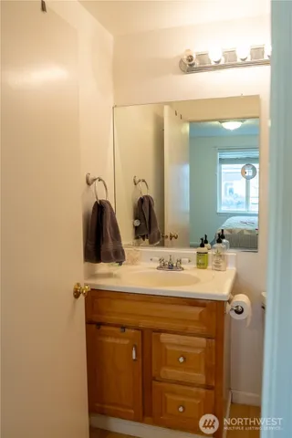 a room with a bed and furniture