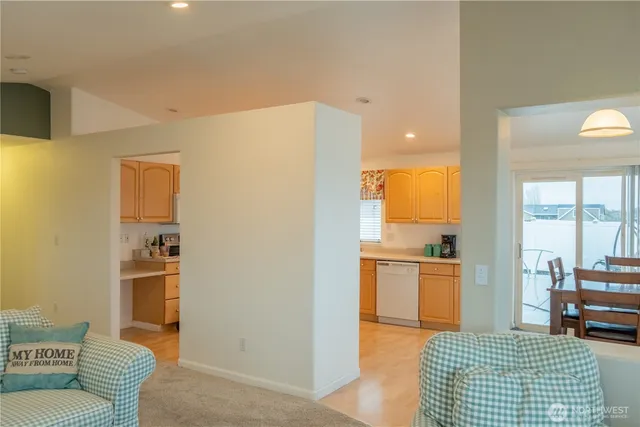a living room with furniture and a rug