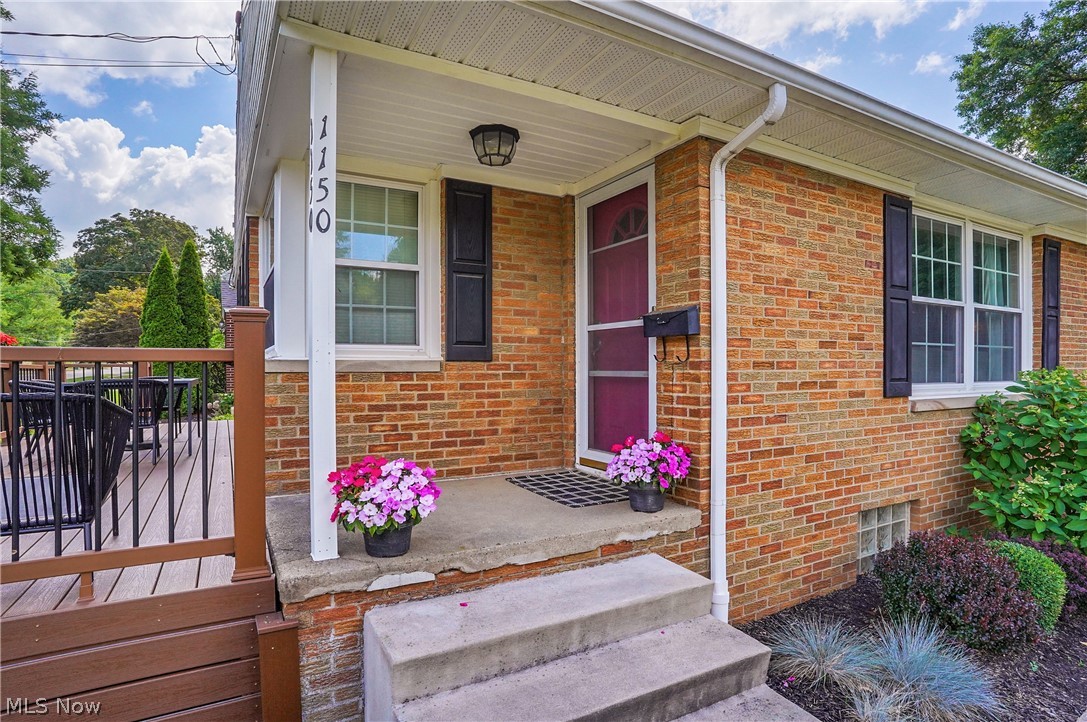 1150 Garman Road Akron, OH 44313 - Photo 4 of 38 Property entrance featuring a porch