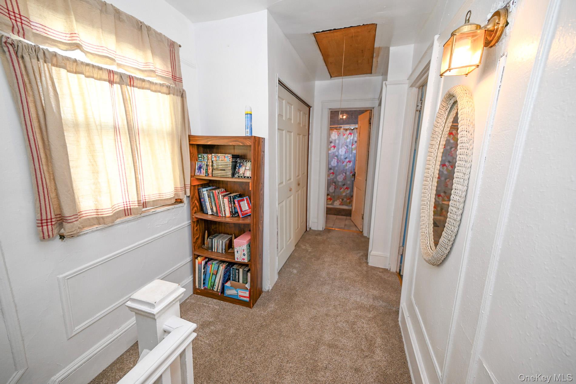 165 Cochran Place Valley Stream, NY 11581 - Photo 11 of 25 Hall with attic access and light carpet