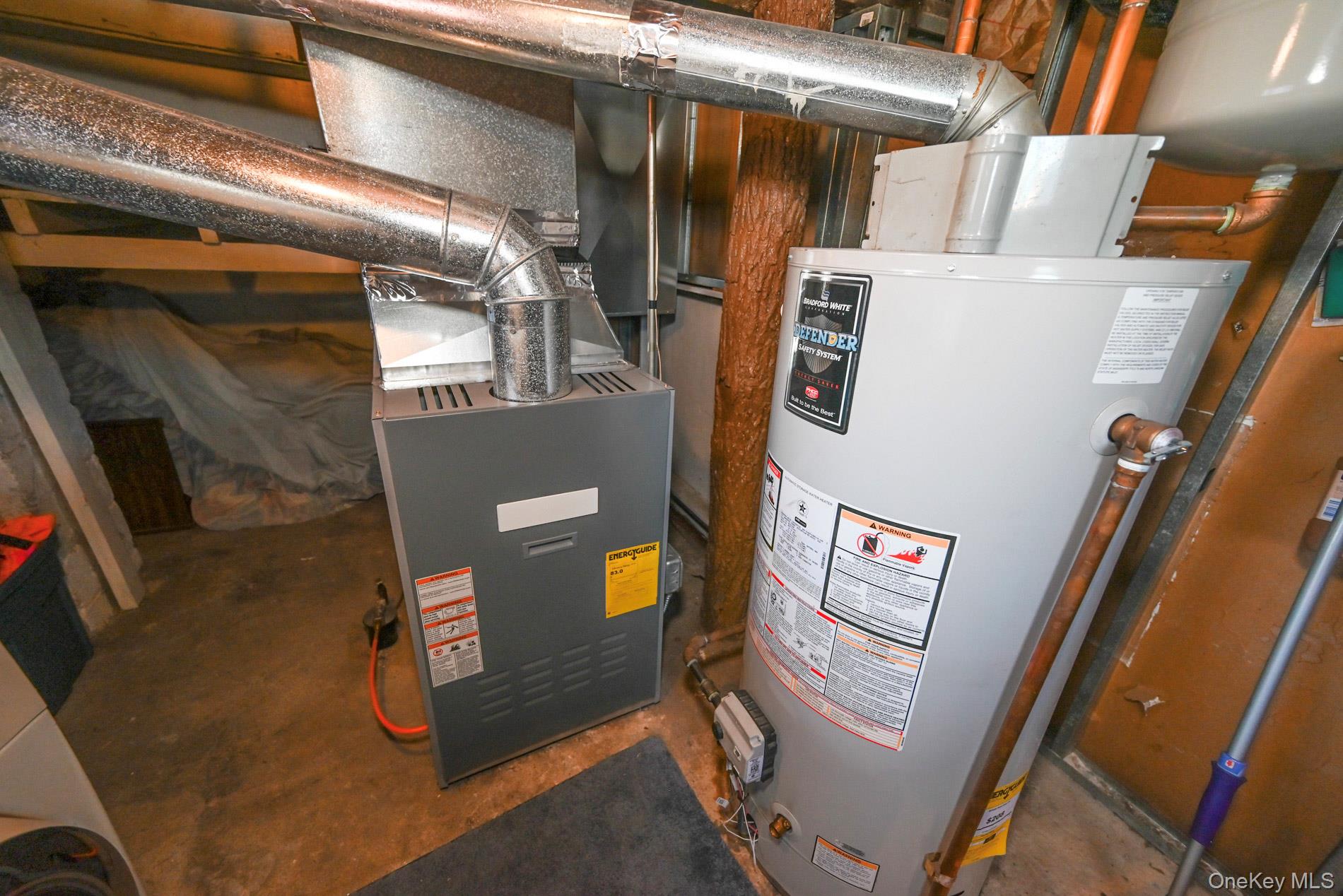 165 Cochran Place Valley Stream, NY 11581 - Photo 18 of 25 Utility room with water heater and heating unit